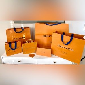 Lot of 5 Louis Vuitton empty gift bags. Extra large, large and medium